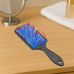 Close-up of massage hair comb bristles with protective balls