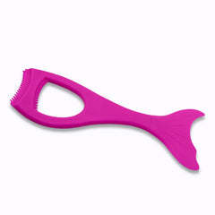 Close-up of silicone eyelash curler and brush
