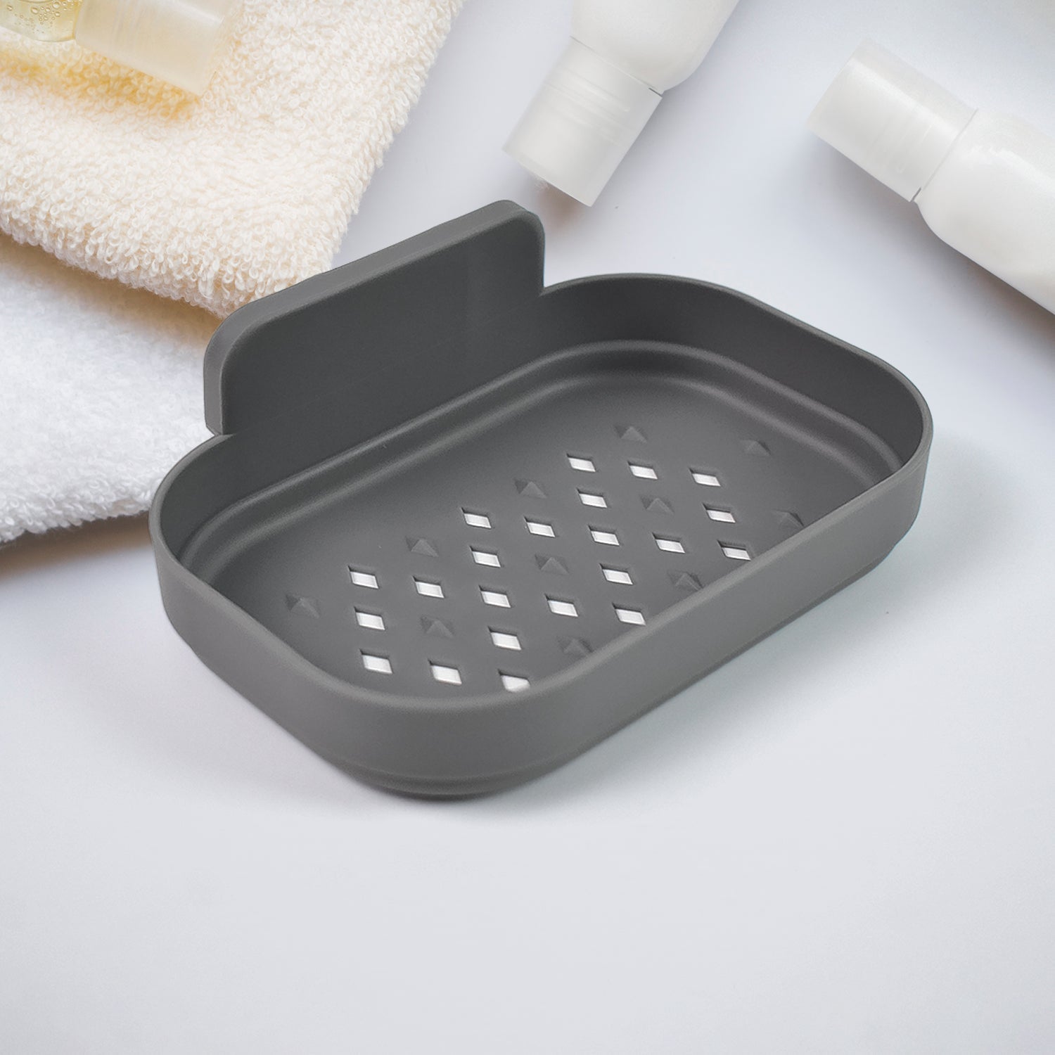 Plastic Soap Dish Holder mounted on bathroom wall
