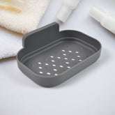 Plastic Soap Dish Holder mounted on bathroom wall