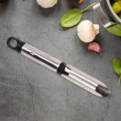 Close-up of the rotating peeler head with different blade types