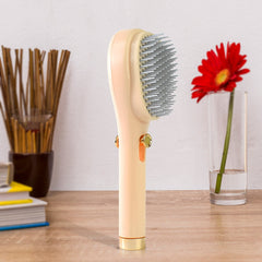 Close-up of self-cleaning mechanism on hairbrush