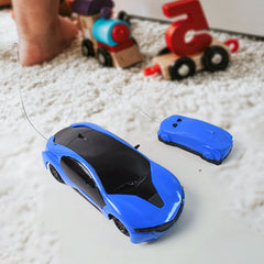 Side angle of remote control racing car with LED lights