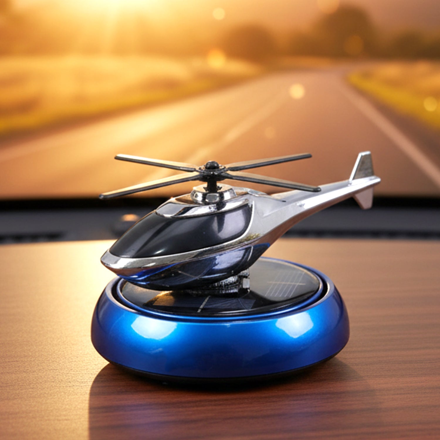 Solar helicopter car dashboard air freshener rotating in sunlight