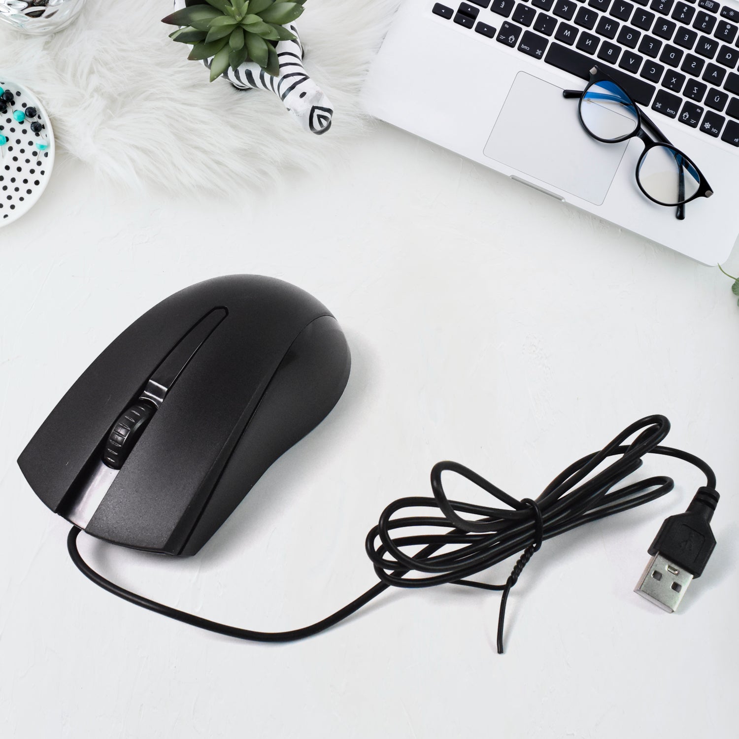 X2 wired optical mouse on white background