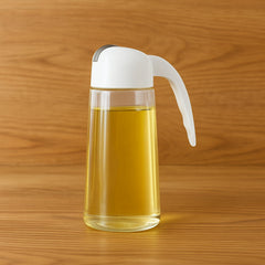 Silicone sealing detail inside glass oil bottle dispenser cap
