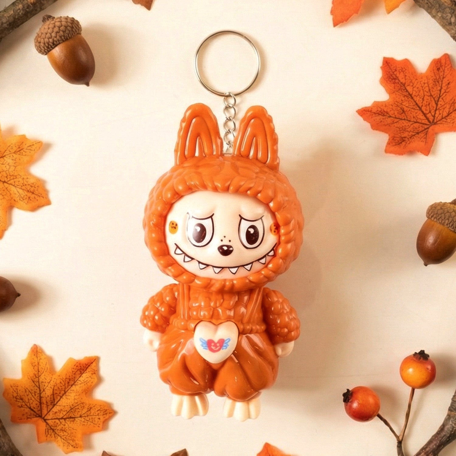 Face Changing Cartoon Character Keychain with 3 expressions showing smiling face