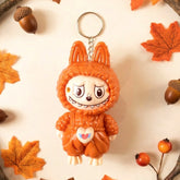 Face Changing Cartoon Character Keychain with 3 expressions showing smiling face