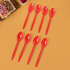 Set of 8 reusable plastic spoons arranged neatly