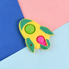 Close-up of the Rocket Fidget Dimple Keychain Toy's silicone bubbles being popped
