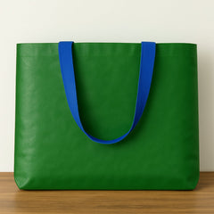 Folded eco-friendly shopping tote bag showing compact size