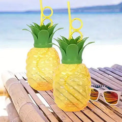 Top view of pineapple shaped cup with lid and straw