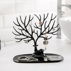 Deer-shaped jewellery holder side view India