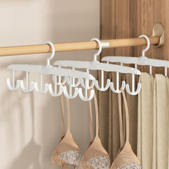 Tank tops hanging from rotatable hanger hooks