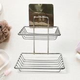 Stainless steel wall mounted soap dish with two hooks holding soap in a modern bathroom