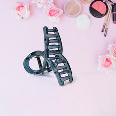 Close-up of hair barrette clamp open