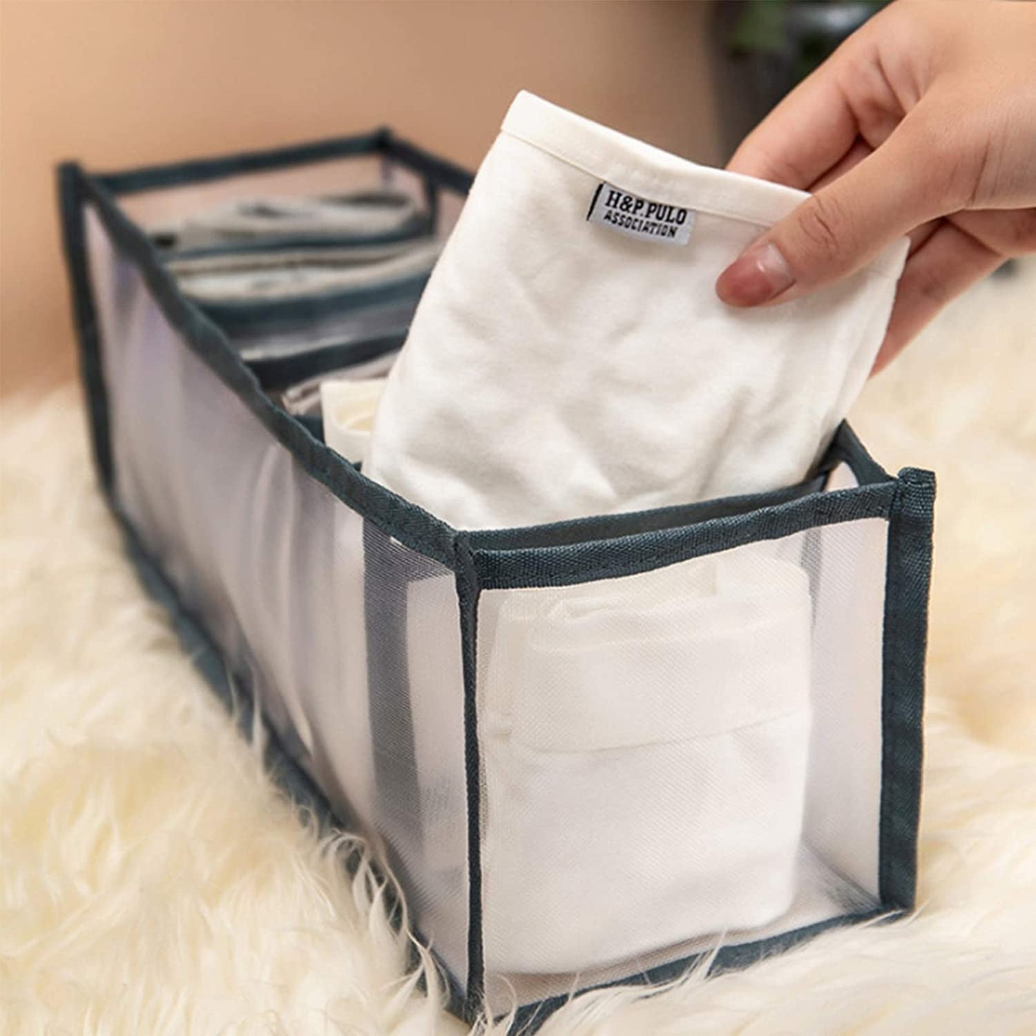 Organivo 7 Grid Clothes Organizer filled with folded jeans & t-shirts