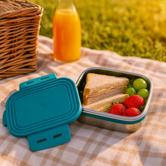 Apex 200ml mini container next to a lunchbox for scale