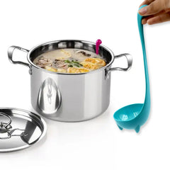 Silicone strainer spoon hanging by loop