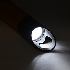 Mini torch switched on in dark environment