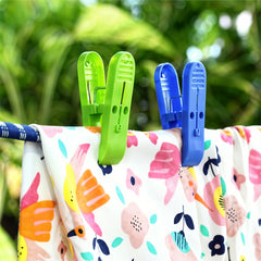 Variety of plastic cloth clips in red, green, yellow, and blue colors.