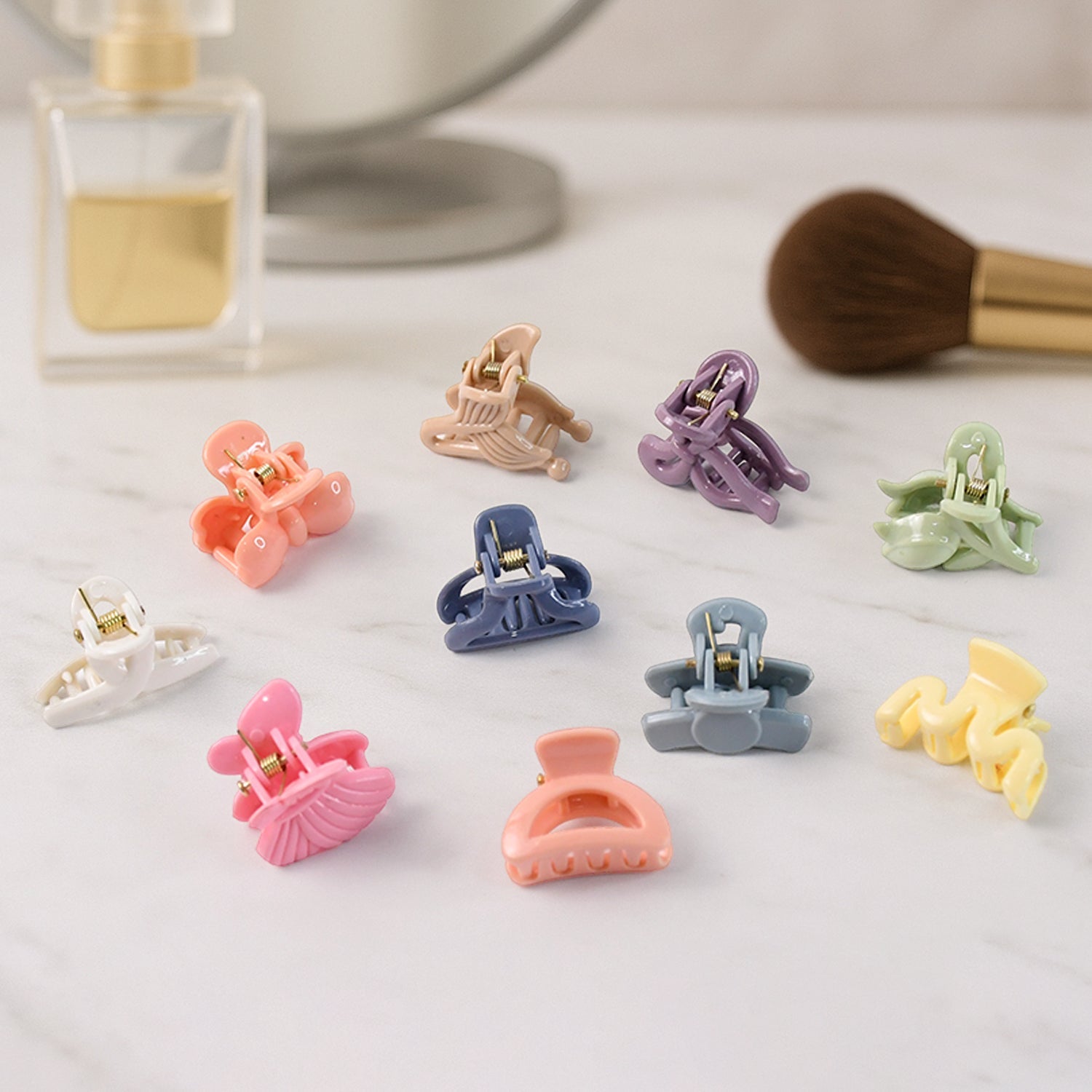 Set of 6 multicolour mini hair claw clips with butterfly design