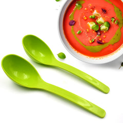 Plastic kitchen ladle 2-piece set black on wooden surface