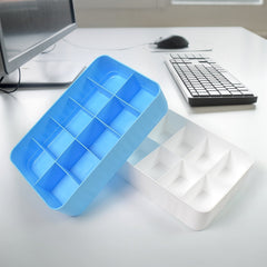 Drawer storage organizer showing compartments