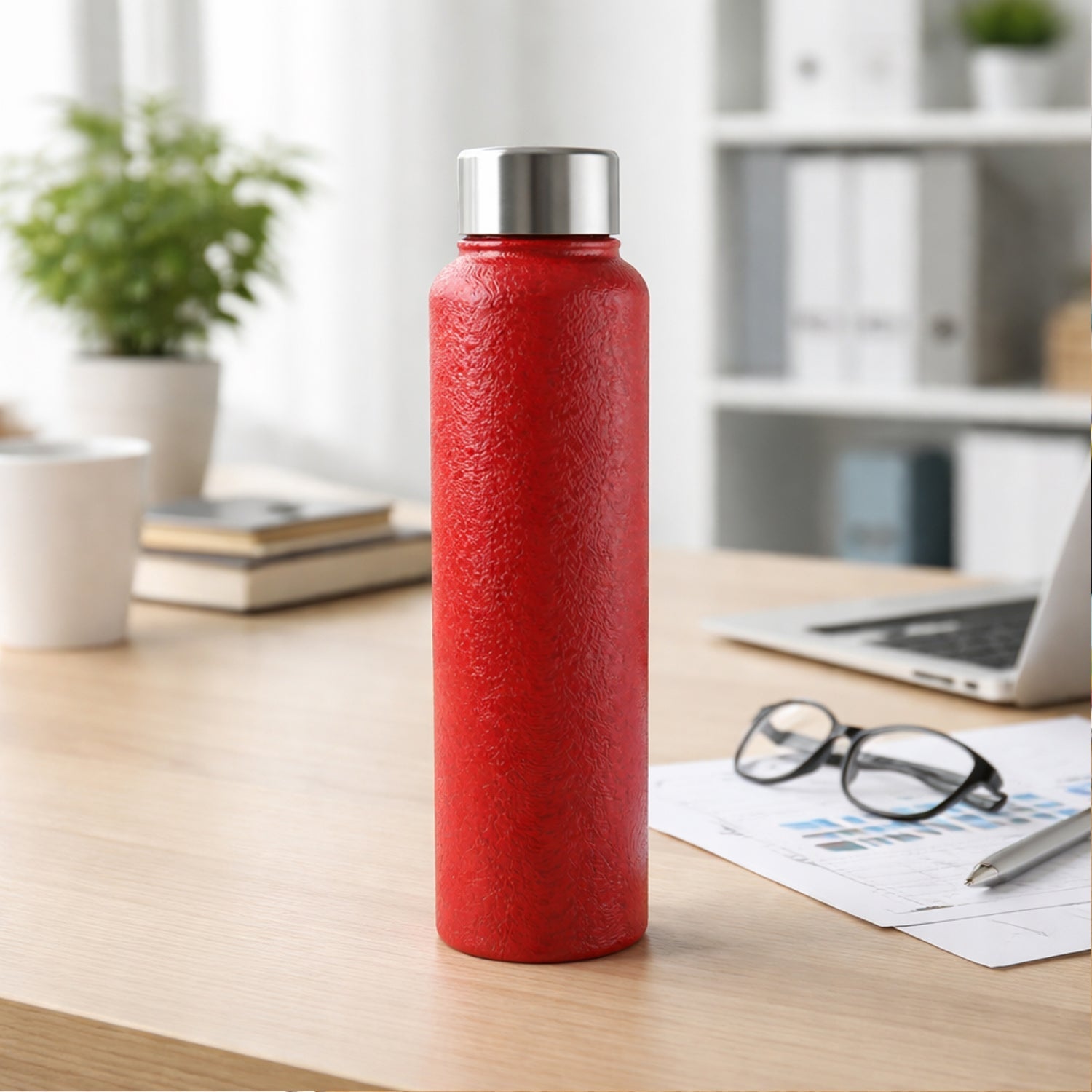 Red stainless steel water bottle front view