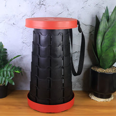 Folded telescopic stool showing compact disc shape