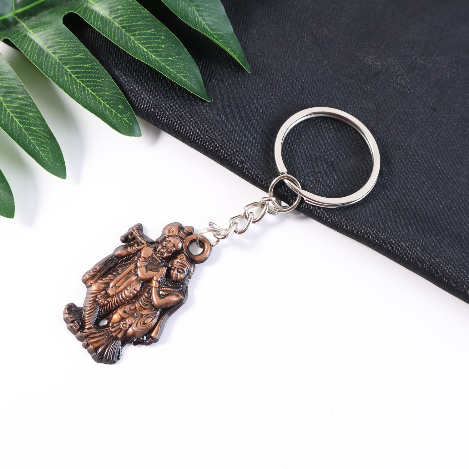 Radha Krishna metal keychain with antique finish