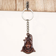 Lord Shiva face keychain on a white background