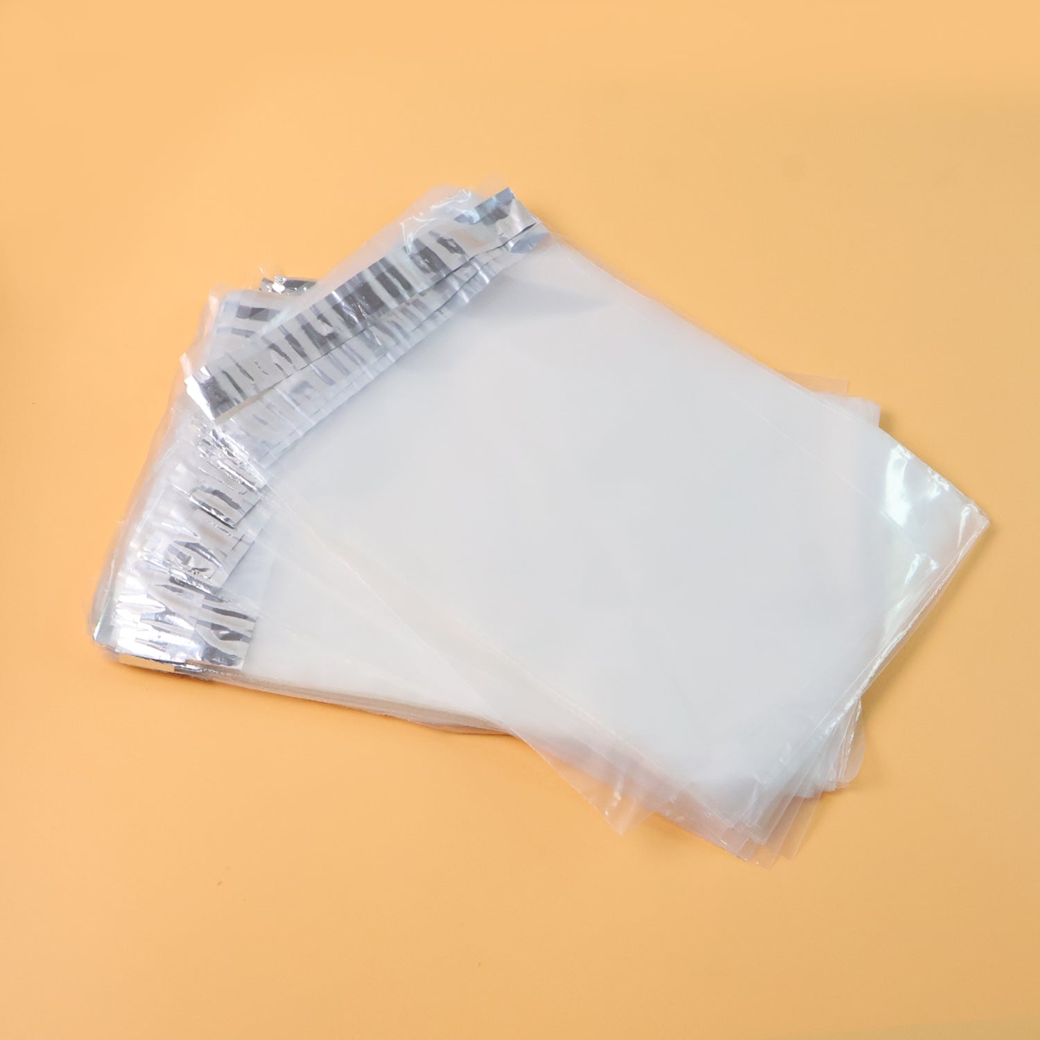 Transparent self-adhesive courier polybag for secure packaging