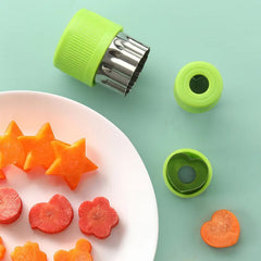 Close up of stainless steel cookie cutters with handles - SweetShapes Pro