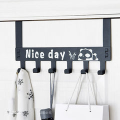 Detail of the 'Nice Day' panda cartoon design on the hook rack