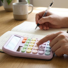 Electronic calculator with soft press multicolor keys