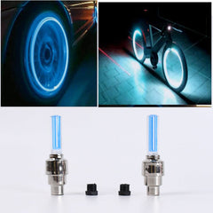 Close-up of glowing mixed-color LED tire valve caps