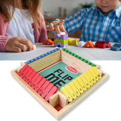 Rolling dice in Shut The Box wooden game