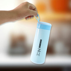 Close-up view of blue capped plastic flask