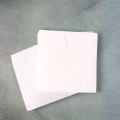 Stack of Zat-Pat non-stick food paper sheets
