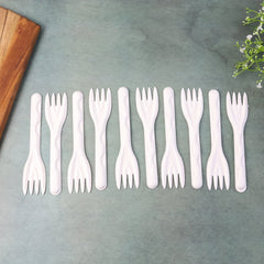 Compostable bagasse fork on a table setting