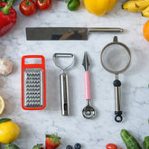 5-in-1 kitchen tool set with chopper, grater, peeler, scoop & strainer