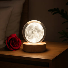 3D Crystal Ball Lamp glowing on base in bedroom setting