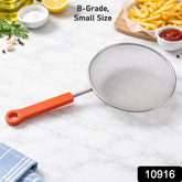 Kitchen strainer in use with food ingredients