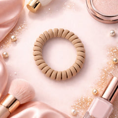 Soft stretchable spiral coil hair band on white background