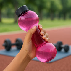 User holding FitFuzion dumbbell water bottle during workout