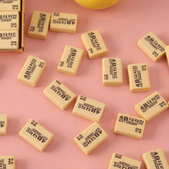 Bright yellow rectangular 4B eraser