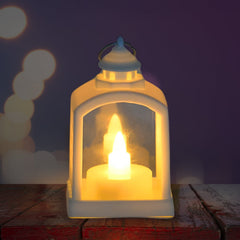 Smokeless LED lantern glowing softly on a traditional Indian setting.