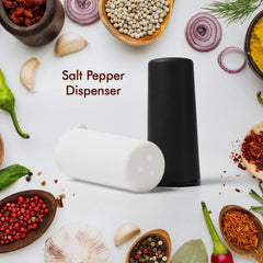 Salt and pepper dispensers placed on table