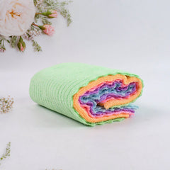 Microfiber cloth absorbing water on surface